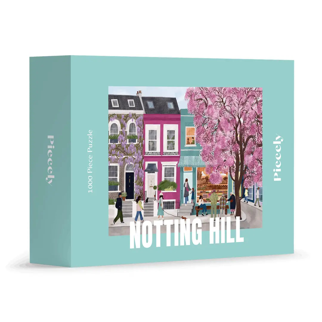 Puzzle 1000 pièces illustrant une rue colorée de Notting Hill à Londres avec maisons pastel, passants et arbre en fleurs.