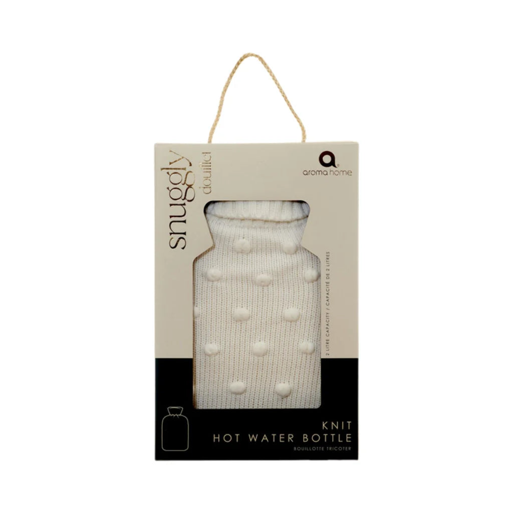 Bouillotte tricotée à pompons